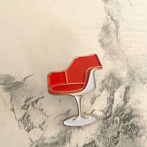 Red retro chair enamel pin